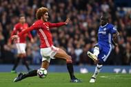 LONDON, ENGLAND - OCTOBER 23: N'Golo Kante of Chelsea passes the ball past Marouane Fellaini of Manchester United during the Premier League match between Chelsea and Manchester United at Stamford Bridge on October 23, 2016 in London, England.  (Photo by Mike Hewitt/Getty Images)